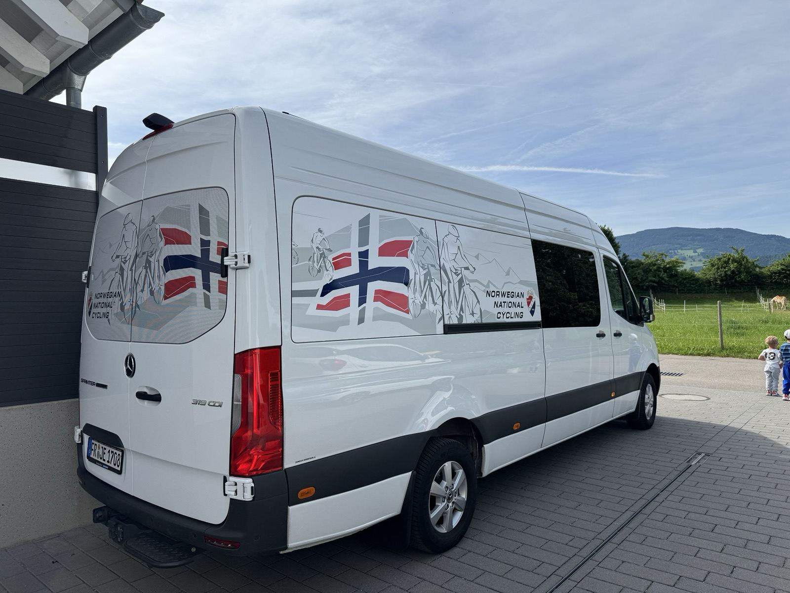 Team vehicle with marked advertising spaces